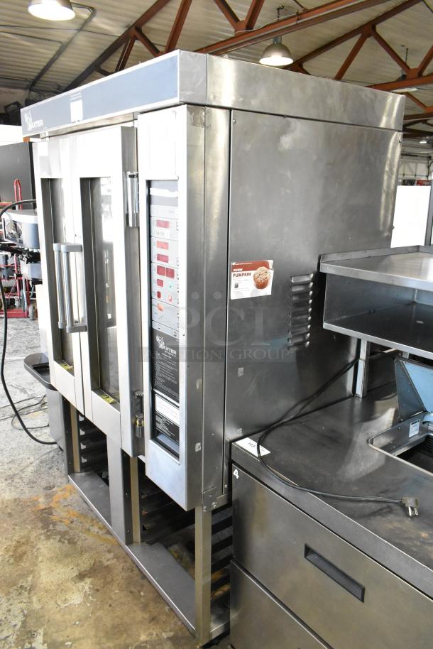 Baxter stainless steel commercial natural gas mini rotating rack oven, double pan rack, with casters, in good condition.