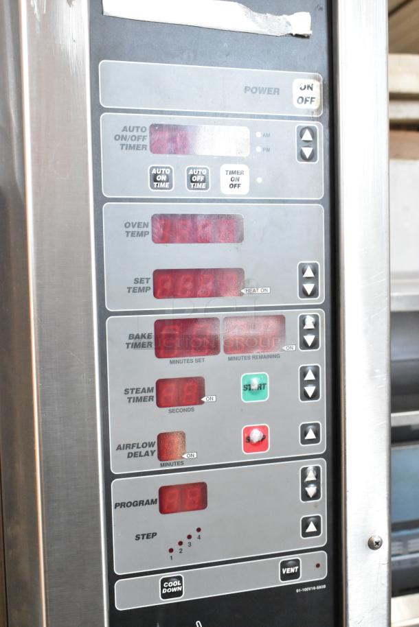 Baxter stainless steel control panel with settings for oven temperature, timers, and airflow, showcasing operational details.