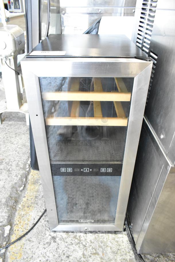 Koldfront TWR247ESS metal mini thermoelectric wine cooler, 115 volts, 1 phase, with glass door and interior wooden shelves.