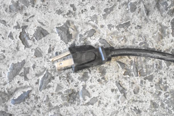 Koldfront TWR247ESS power cord plug on textured surface, 115V, 1 Phase.