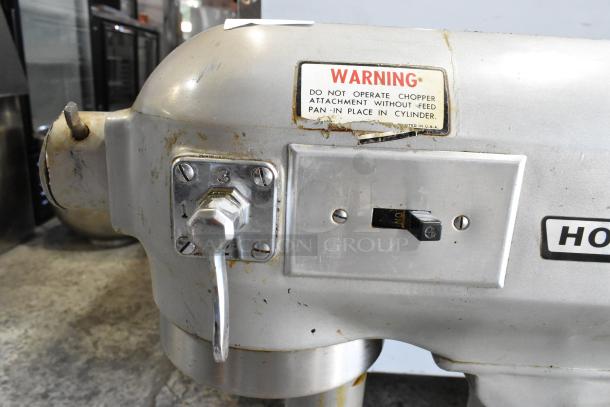 Hobart 20 Quart Planetary Dough Mixer, used. Features speed dial, warning label, 115V, 1 phase.