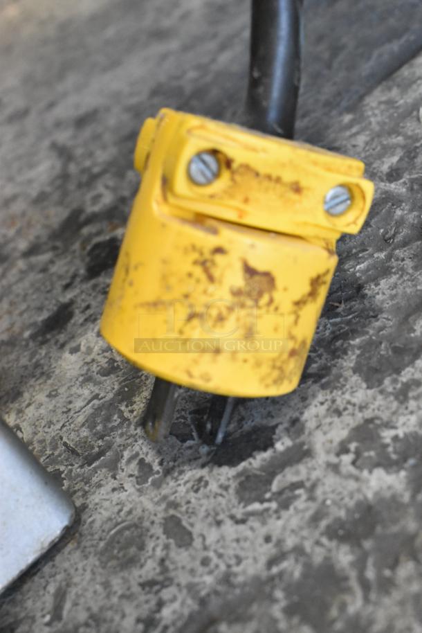 Yellow power cord plug from Hobart Metal Commercial Countertop 20 Quart Planetary Dough Mixer. 115 Volts, 1 Phase. Scratched finish.