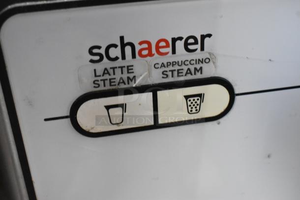 2018 Schaerer Barista espresso machine control panel, showing "Latte Steam" and "Cappuccino Steam" buttons.