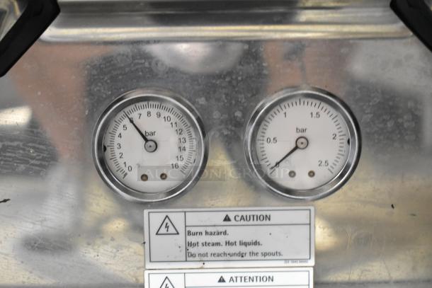 2018 Schaerer Barista stainless steel 2-group espresso machine gauges, bar readings, caution labels visible.