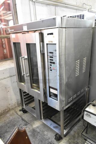 Baxter stainless steel commercial gas mini rotating rack oven, double pan rack, commercial casters, excellent condition.