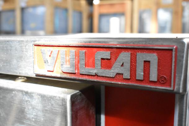 Vulcan VPX5 stainless steel steam cabinet with equipment stand, red logo visible; 208V, 1/3 phase, commercial use.