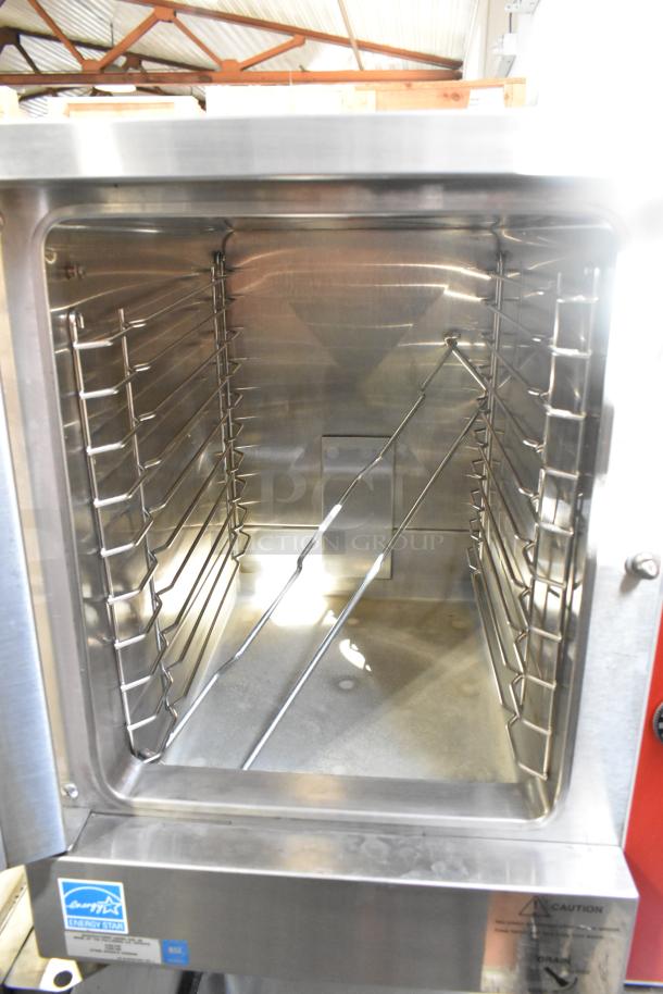Vulcan VPX5 stainless steel steam cabinet, single deck, on stand. 208V, 1/3 phase. Energy Star label visible. Excellent condition.