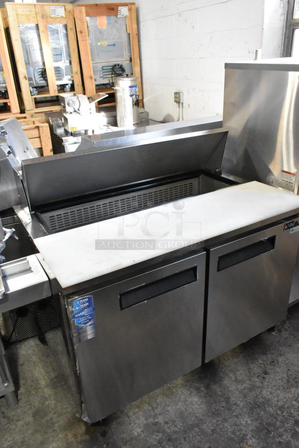 Dukers DSP48 stainless steel commercial sandwich salad prep table with Bain Marie mega top, on casters. 115V, 1 phase.