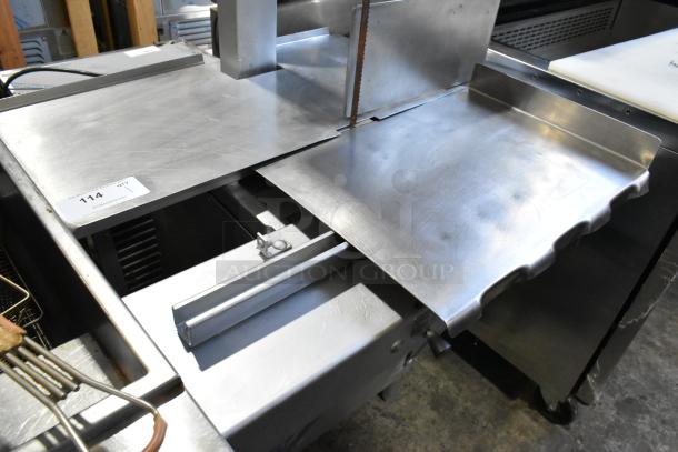 Hobart 5212 commercial meat saw, floor style, 200-230 volts, 3 phase. Stainless steel, used condition, visible auction tag "114".