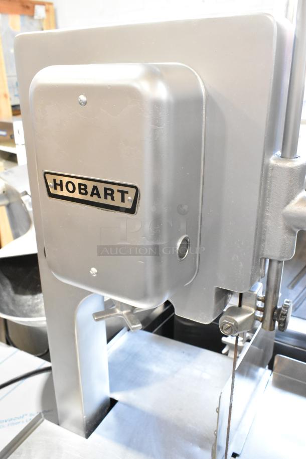 Hobart 5212 metal commercial floor meat saw, 200-230V, 3 phase, stainless steel, good condition, Hobart logo visible.