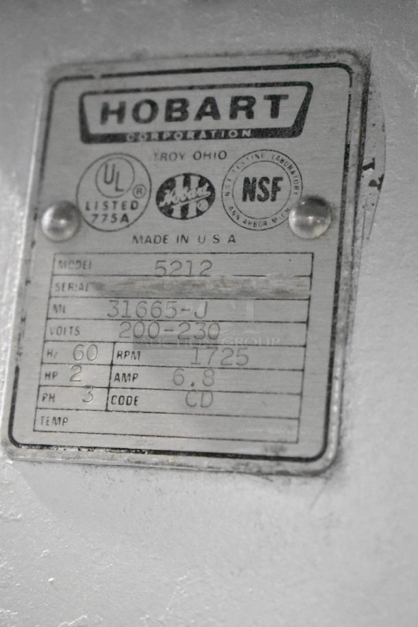 Hobart 5212 meat saw label detailing model, serial 31665-J, 200-230 volts, 3 phase, 2 HP, 6.8 amp, 1725 RPM.