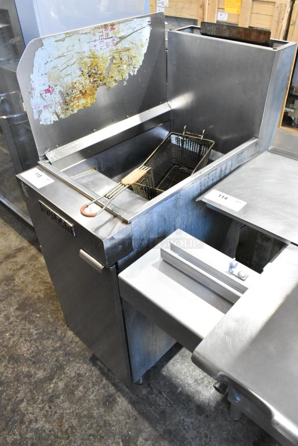 Vulcan LG300 stainless steel commercial deep fat fryer, natural gas-powered, 90,000 BTU, with metal fry basket.