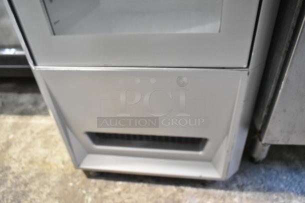 RB-SMC 106 ECO metal single door reach-in cooler merchandiser, 115 volts, slim design, visible vent detail.