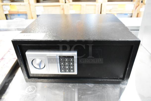 Black metal safe with digital keypad, no combination included; slightly used condition.