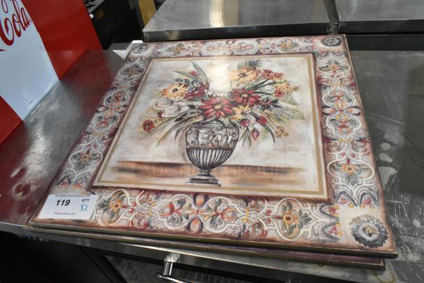 Floral art print with ornate border, depicting a vase with flowers. Includes auction tag "119 X2." Good condition.