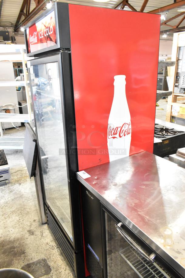 IDW G-26SI-C-3-3-4-B-5 reach-in cooler, single door, red Coca-Cola branding, poly coated racks, 115V, used condition.