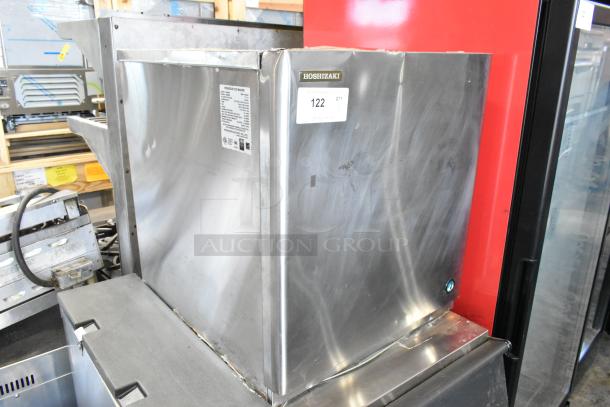 Hoshizaki KMD-410MAH stainless steel ice head on bin, 115V, 1 phase, commercial use. Visible labels with specs.