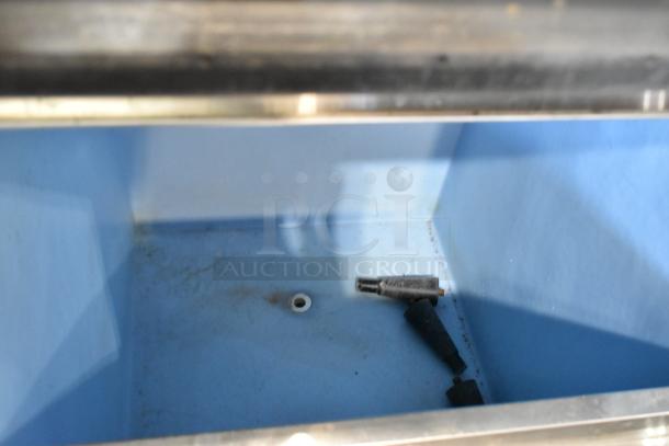 Hoshizaki KMD-410MAH stainless steel ice head on ice bin, 115 Volts, 1 Phase, commercial use. Interior shows mild wear.