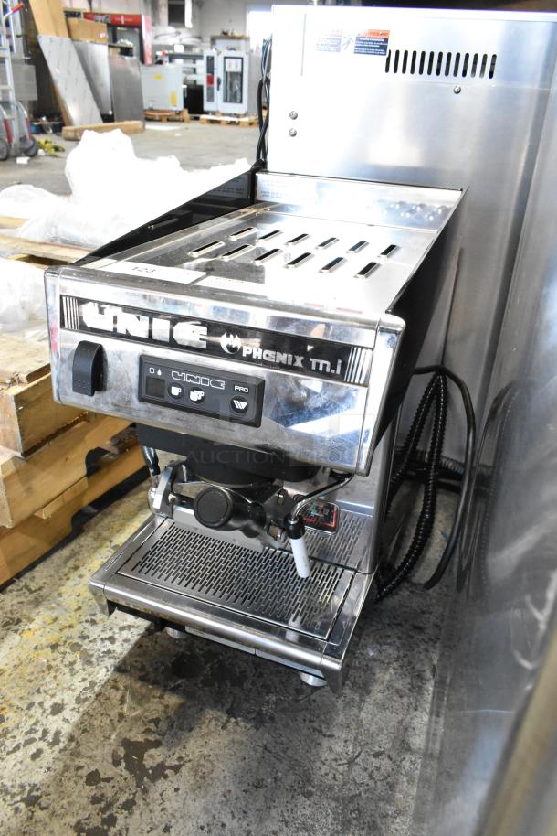 Unic Phoenix MI stainless steel commercial single group espresso machine, 110V, lightly used, with visible branding.