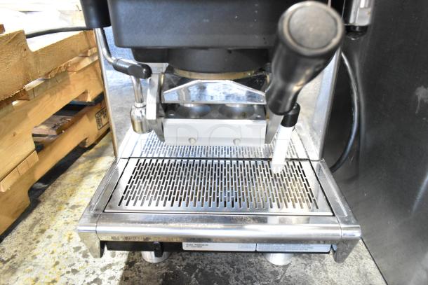 Unic Phoenix MI stainless steel commercial espresso machine, single group, visible drip tray, black and silver finish, 110V.