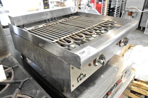 Star Max stainless steel countertop electric charbroiler grill, used, commercial-grade, with knob controls and heating elements.