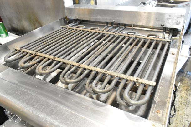 Star Max stainless steel electric charbroiler grill, commercial countertop model, showing heating elements and grill grates.