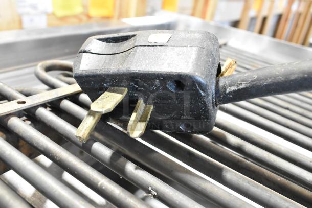 Star Max Stainless Steel Electric Charbroiler Grill, with visible power plug and grate, in used condition.