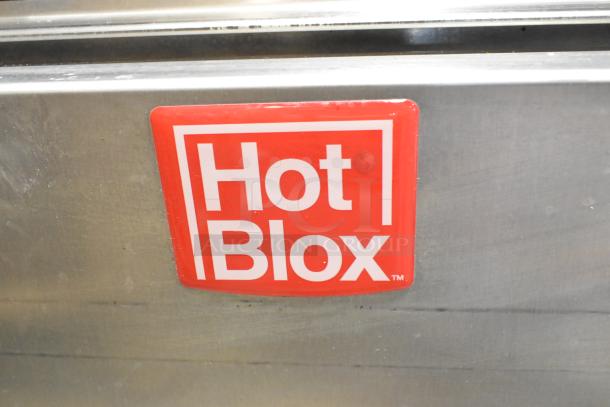 Metro HBCW8-AS-UC heated holding cabinet, stainless steel, Hot Blox label, on casters, 120V, 1 phase, commercial use.