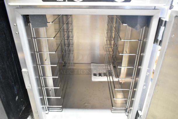 Metro HBCW8-AS-UC stainless steel heated holding cabinet with commercial casters, interior view, 120V, 1 phase, excellent condition.