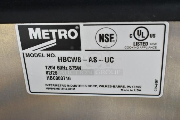2025 Metro HBCW8-AS-UC stainless steel heated holding cabinet, 120V, on commercial casters. Model label shown.