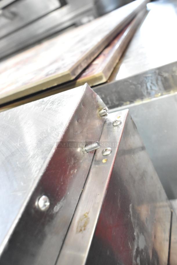 Turbo Air TPR-67SD-D4 stainless steel pizza prep table, 4 drawers, visible wear, 115V, 1 phase, commercial use.