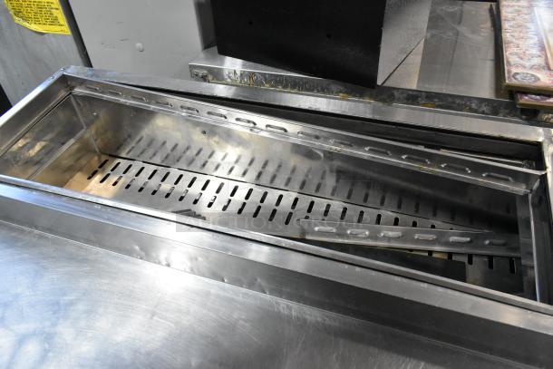 Turbo Air TPR-67SD-D4 stainless steel pizza prep table, 4 drawers, 115V, 1 phase, clean interior, commercial use.