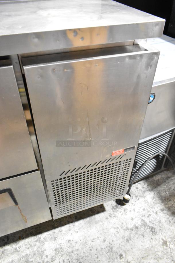 Turbo Air TPR-67SD-D4 stainless steel pizza prep table with 4 drawers. 115V, used condition, minor wear marks.