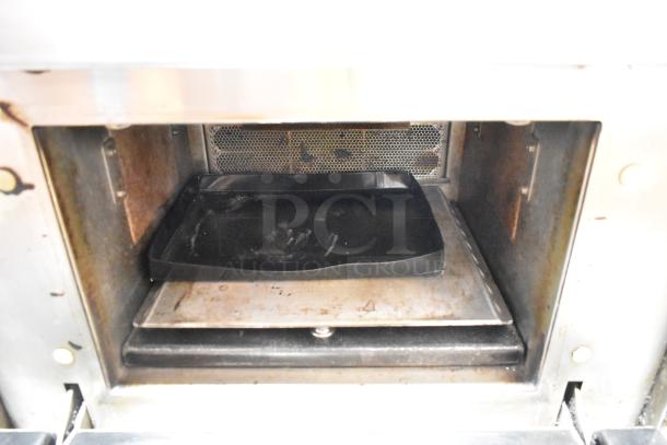 Merrychef eikon e4 stainless steel commercial rapid cook oven interior with tray, 208/240 Volts, 1 Phase.