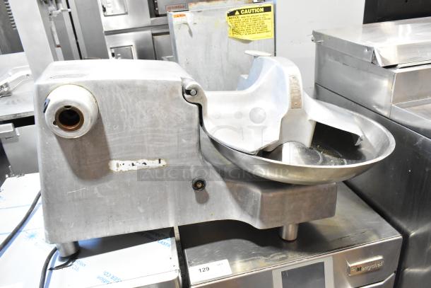 Hobart 84186 metal commercial countertop buffalo chopper with S blade, 115 volts, 1 phase. Used condition. Visible caution labeling.