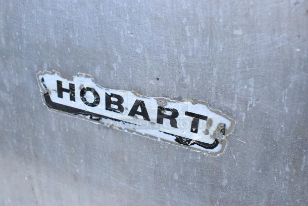 Hobart 84186 metal commercial buffalo chopper with visible label. Features S blade, 115 volts, 1 phase. Worn logo.