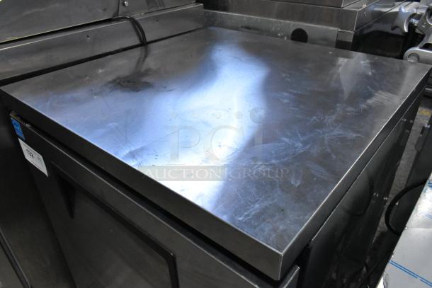 True TUC-24 stainless steel undercounter cooler, single door, commercial use, 115 volts, 1 phase, visible surface wear.