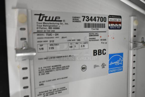 True TUC-24 stainless steel undercounter cooler label showing model, voltage 115, phase 1, Energy Star certification.