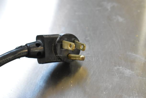 True TUC-24 stainless steel undercounter cooler, 115V, 1 phase power cord shown.