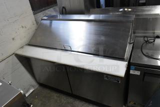 Avantco 178SSPT60MHC stainless steel sandwich salad prep table, mega top, on commercial casters, 15V, 1 phase.