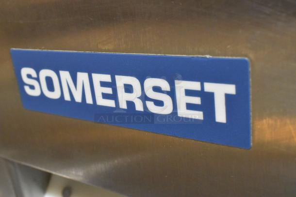 Somerset CDR-100P stainless steel dough sheeter, commercial countertop model, 115 volts, 1 phase, Somerset label visible.