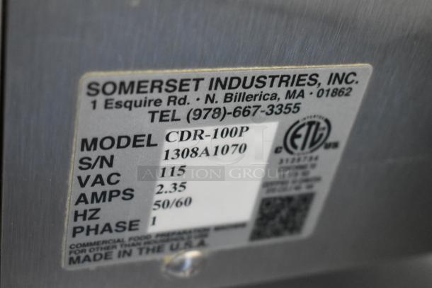 Somerset CDR-100P stainless steel dough sheeter label showing model, serial number, voltage, and certification details.