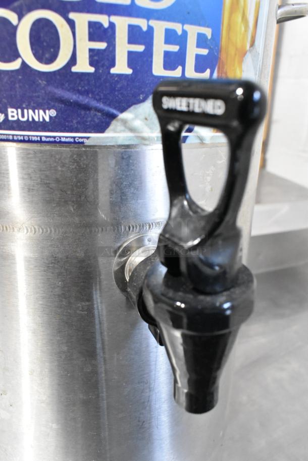 Bunn ICD-3 stainless steel beverage dispenser with "SWEETENED" handle. Slight wear visible.