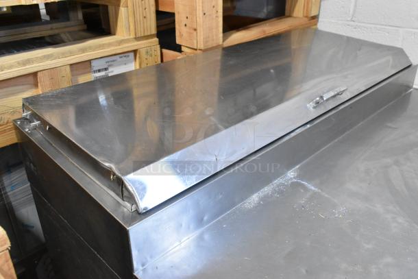 Turbo Air TPR-44SD-D2 stainless steel pizza prep table, two drawers, on commercial casters, 115V, 1 phase. Visible wear.