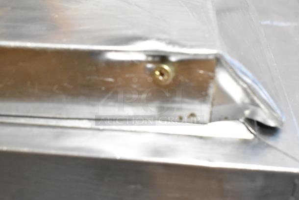 Turbo Air TPR-44SD-D2 commercial pizza prep table corner detail, stainless steel, shows slight wear.