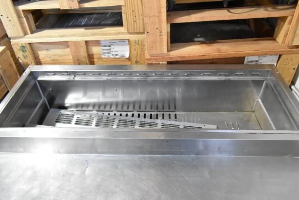 Turbo Air TPR-44SD-D2 stainless steel pizza prep table, 2 drawers, commercial casters, 115V, 1 phase, pristine condition.
