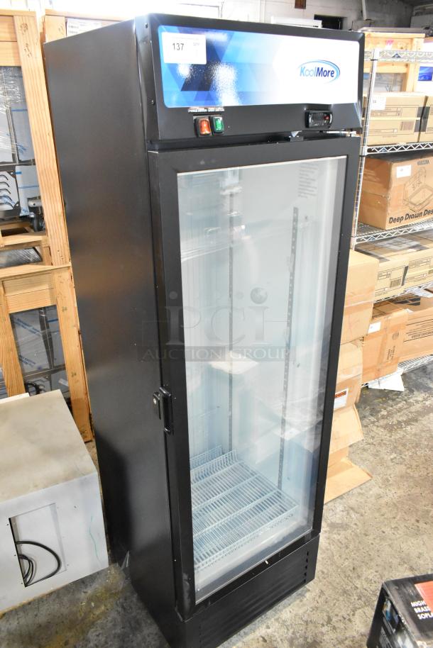 Brand new KoolMore KM-MDF-1GD-12C single door freezer merchandiser, 115V, with scratch and dent, glass door, metal frame.