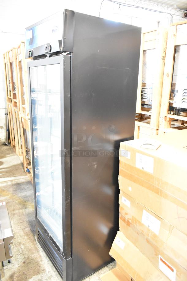 KoolMore KM-MDF-1GD-12C commercial single door reach-in freezer, metal, 115 volts, slight scratches, new condition.