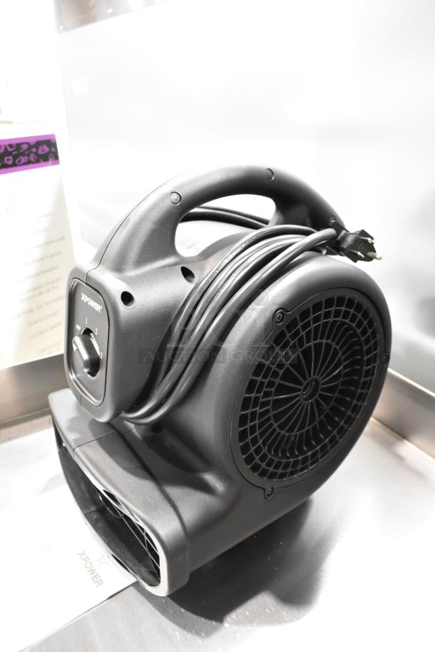 BRAND NEW Xpower P-80A Air Mover in box. Features durable black casing, three-speed control dial, and coiled power cord.