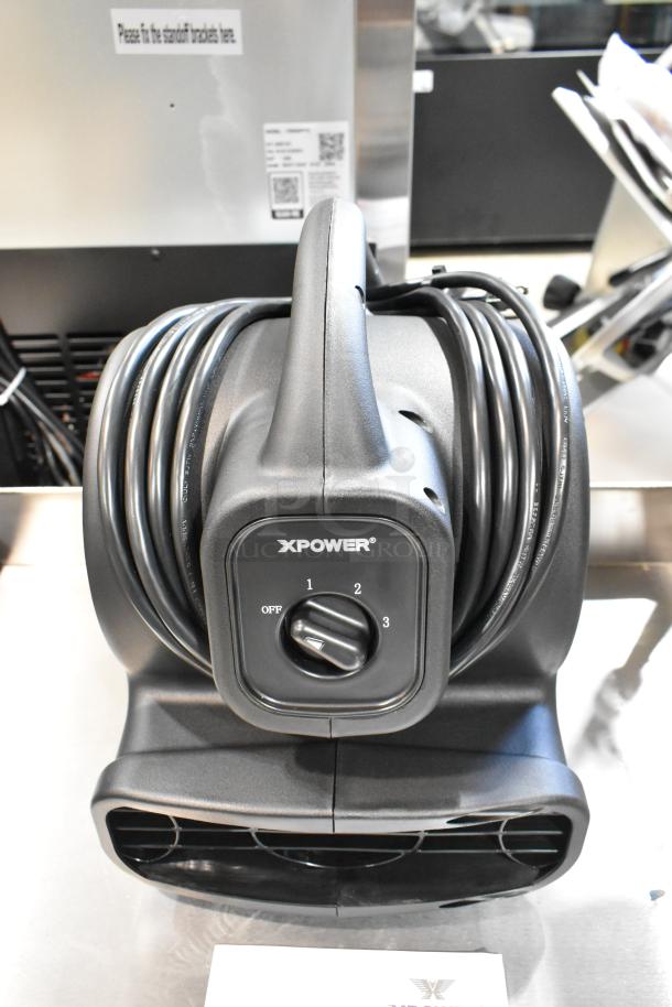 Brand new Xpower P-80A air mover with adjustable settings and coiled cord, in pristine condition.